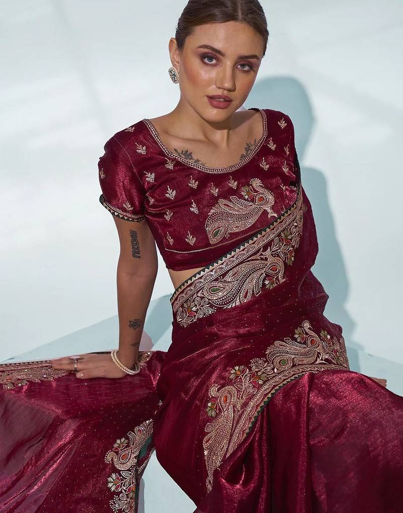 maroon ethnic motifs embroidered organza saree