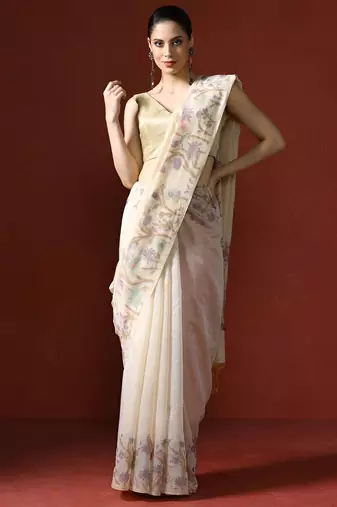 Pink embroidered ethnic motifs sequinned net saree