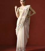 Pink embroidered ethnic motifs sequinned net saree