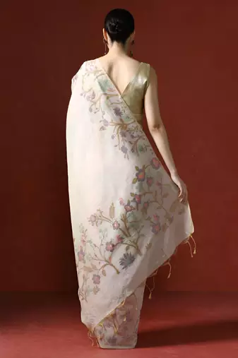 Pink embroidered ethnic motifs sequinned net saree