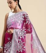 pink embroidered ethnic motifs sequinned net saree