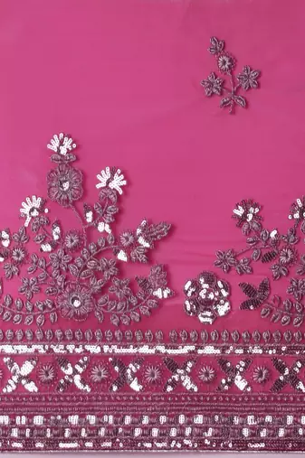 pink embroidered ethnic motifs sequinned net saree