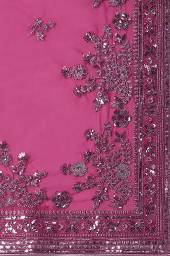 pink embroidered ethnic motifs sequinned net saree