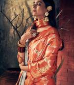 Peach peach-coloured & red floral zari silk blend banarasi saree