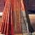 Peach peach-coloured & red floral zari silk blend banarasi saree