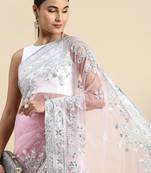 pink embroidered ethnic motifs sequinned net saree