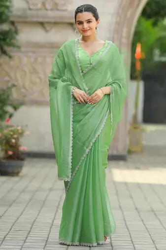 Purple woven design ethnic motifs zari organza saree
