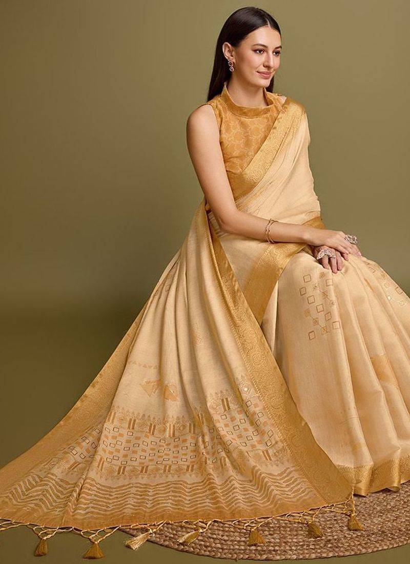 yellow zari woven embroidered tassel saree