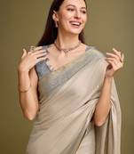 Green bandhani printed embroidered zari saree