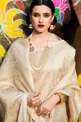 cream cream-coloured & gold-toned woven design zari silk blend banarasi saree