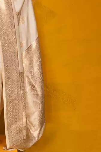 off_white woven design zari banarasi saree