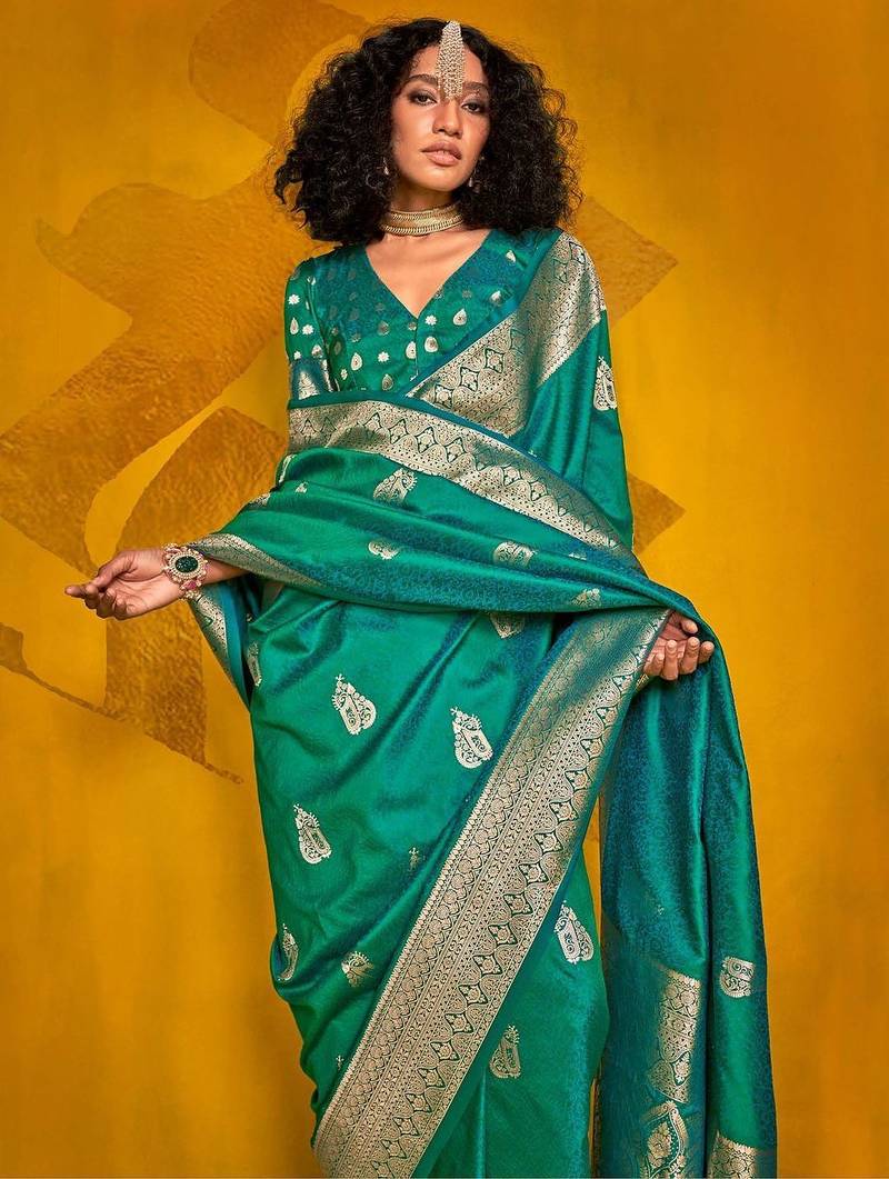 green woven design zari silk blend banarasi saree