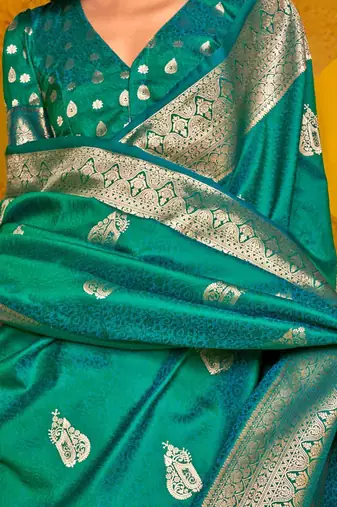 green woven design zari silk blend banarasi saree