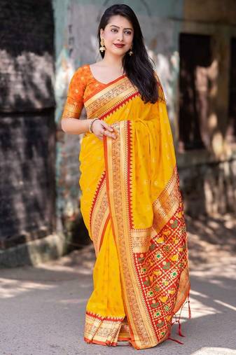 yellow yellow ethnic motifs woven design zari silk patola saree