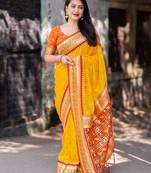 yellow yellow ethnic motifs woven design zari silk patola saree
