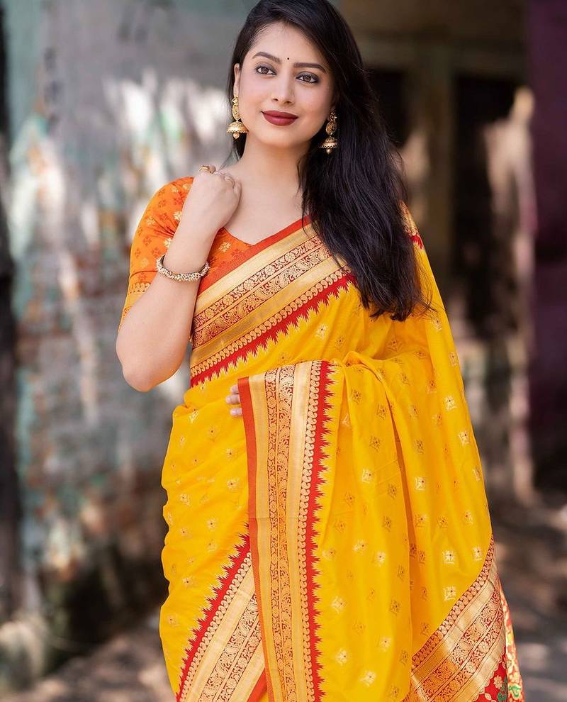 yellow yellow ethnic motifs woven design zari silk patola saree