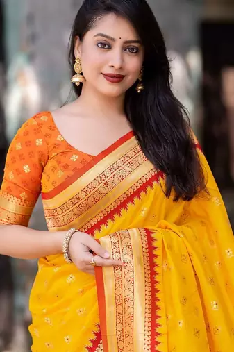 yellow yellow ethnic motifs woven design zari silk patola saree