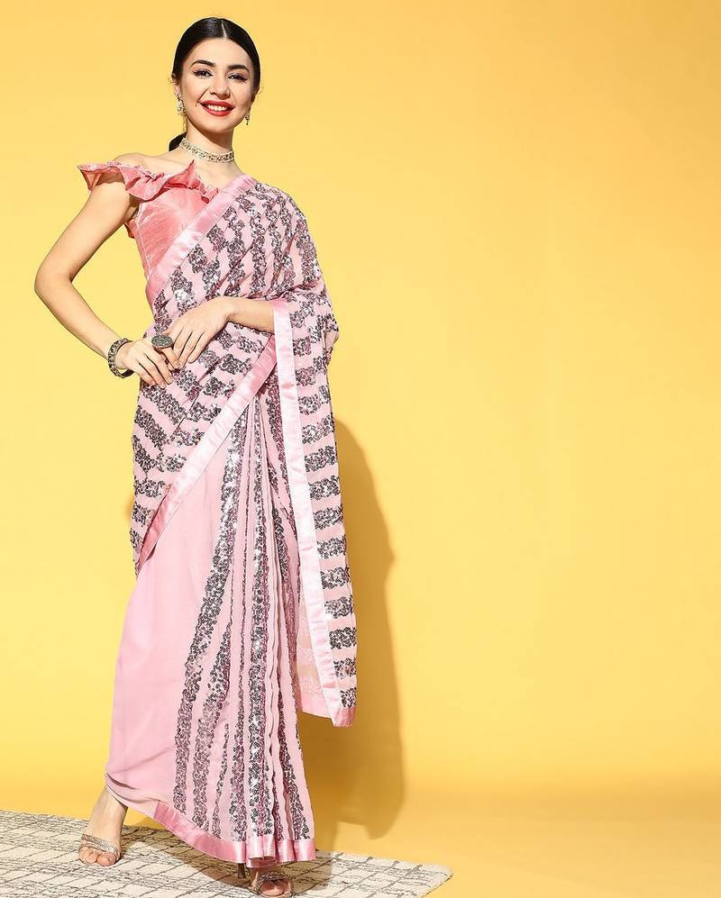 pink women embellished saree with solid border