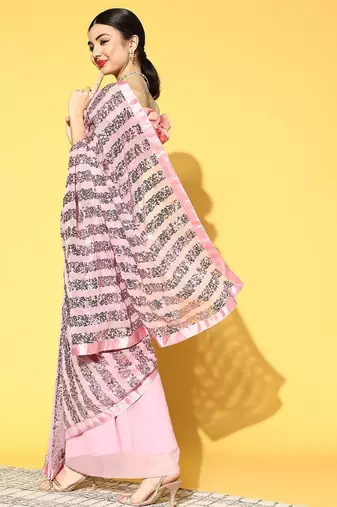 pink women embellished saree with solid border