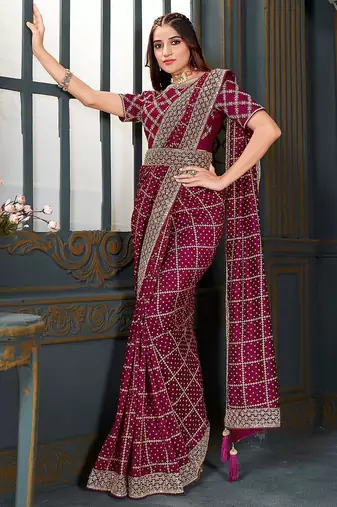magenta bandhani embroidered silk blend saree