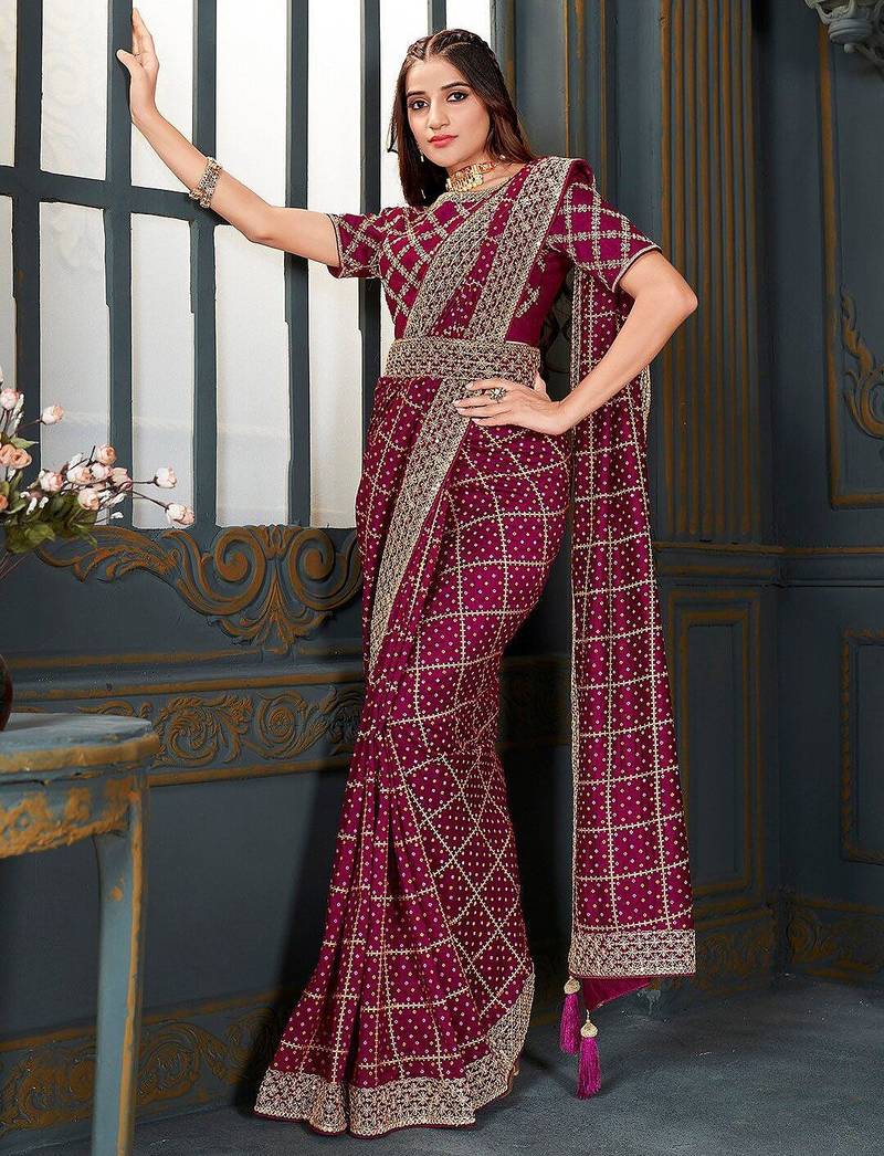 magenta bandhani embroidered silk blend saree