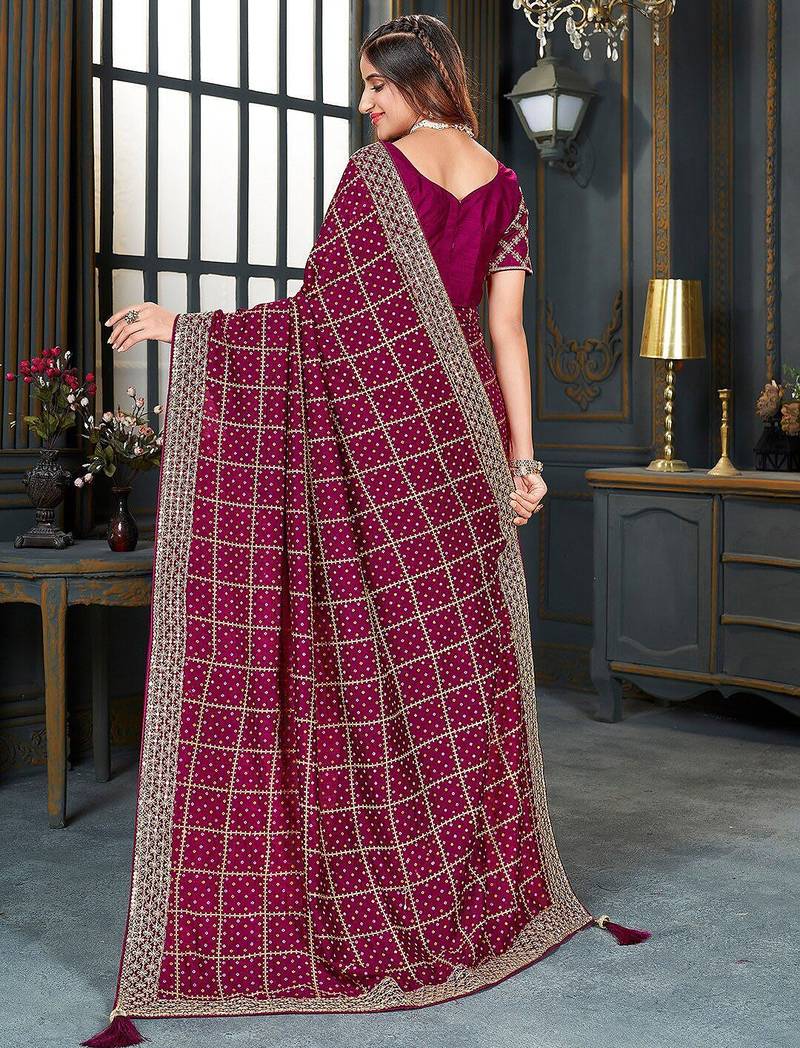 magenta bandhani embroidered silk blend saree