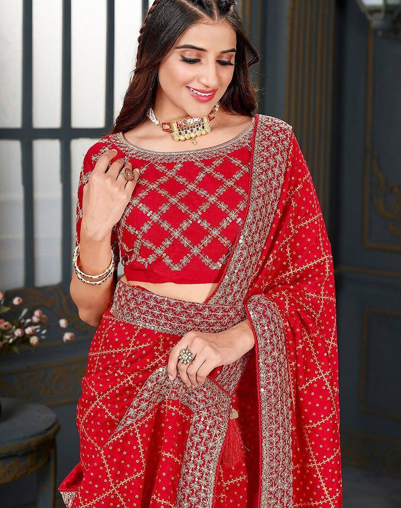 red bandhani printed embroidered zari saree