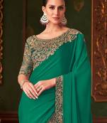 Purple ethnic motif woven design zari banarasi saree