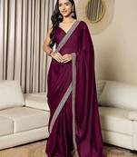Green embroidered satin saree