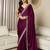 Green embroidered satin saree