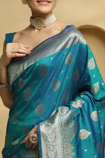 teal ethnic motifs woven design zari soft silk banarasi saree