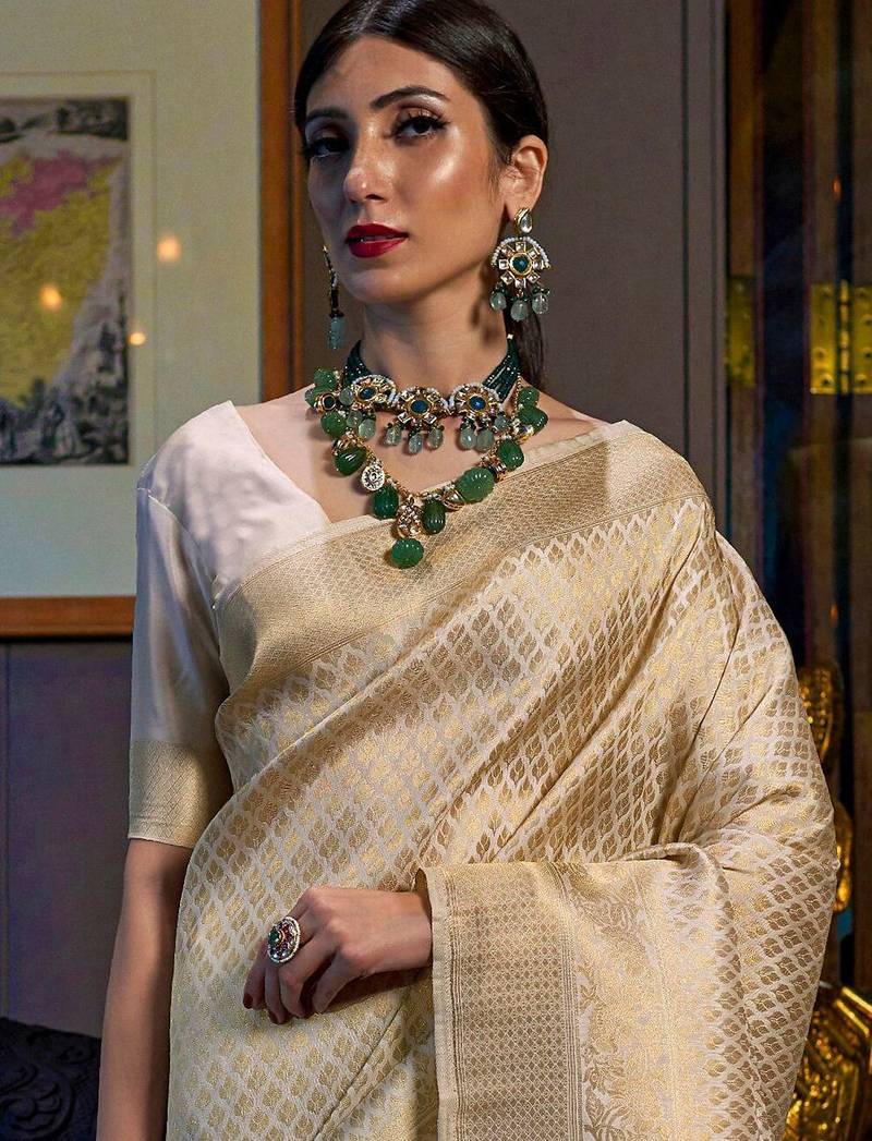 Beige beige & red ethnic motifs woven design zari saree