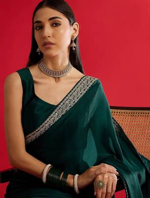 green embroidered satin saree 5