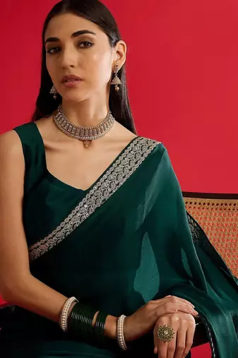 green embroidered satin saree