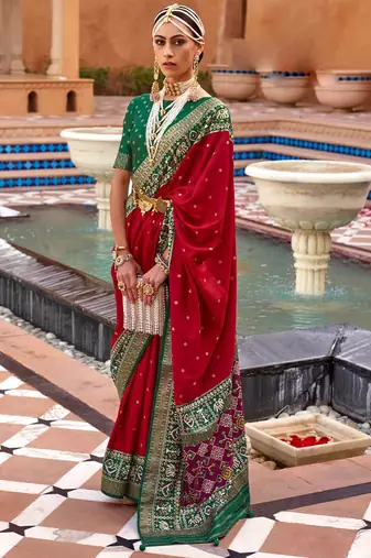 red red & green woven design zari silk blend saree