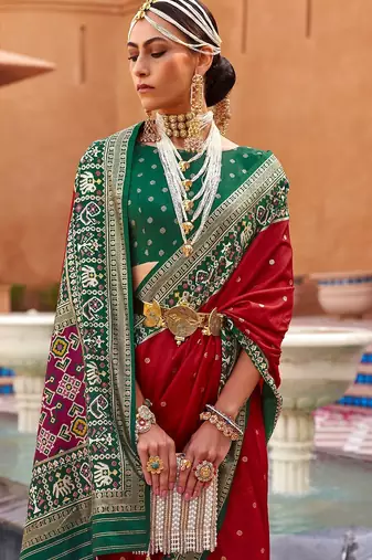 red red & green woven design zari silk blend saree