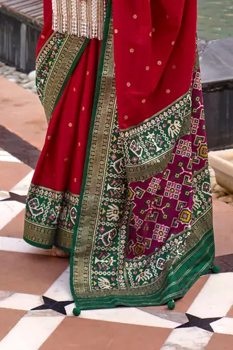 red red & green woven design zari silk blend saree