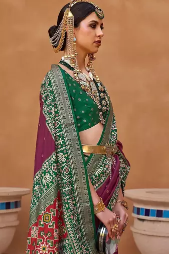 purple purple & green woven design zari silk blend saree