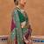 purple purple & green woven design zari silk blend saree