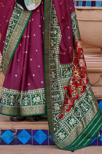 purple purple & green woven design zari silk blend saree