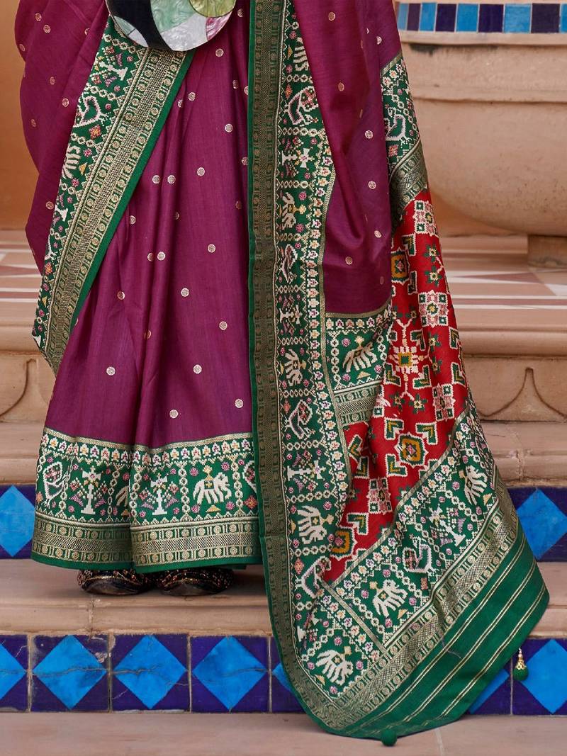 purple purple & green woven design zari silk blend saree