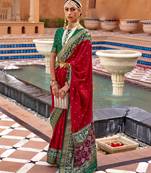 red red & green ethnic motifs woven design zari saree