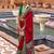 red red & green ethnic motifs woven design zari saree
