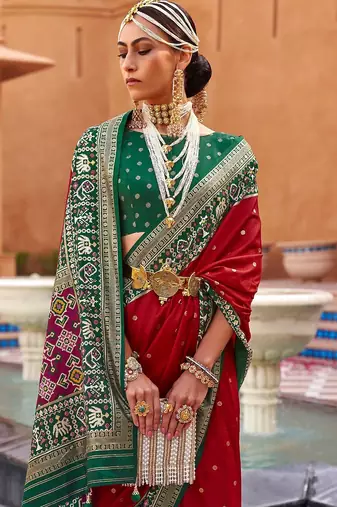 red red & green ethnic motifs woven design zari saree