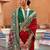 red red & green ethnic motifs woven design zari saree