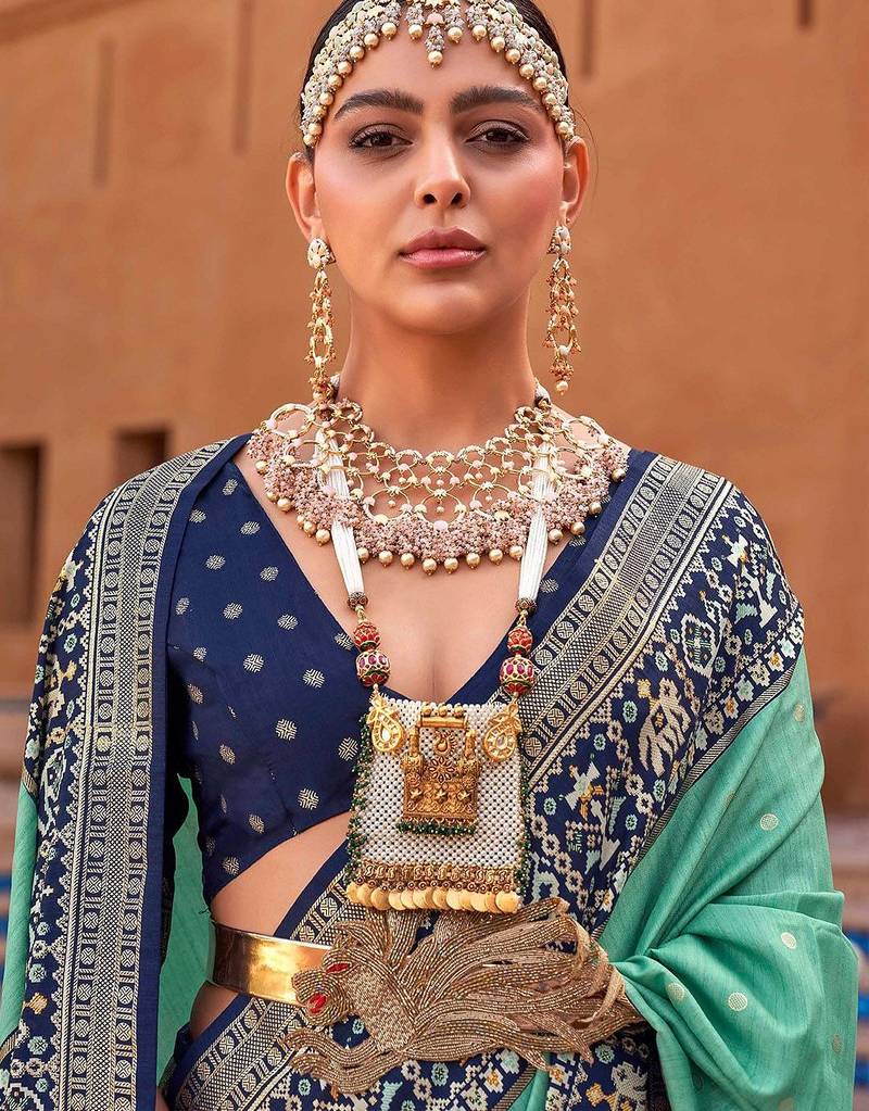 Sea green sea green & gold-toned ethnic motifs zari silk blend banarasi saree
