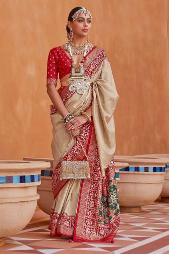Green ethnic motifs printed silk blend saree