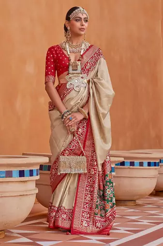 Green ethnic motifs printed silk blend saree