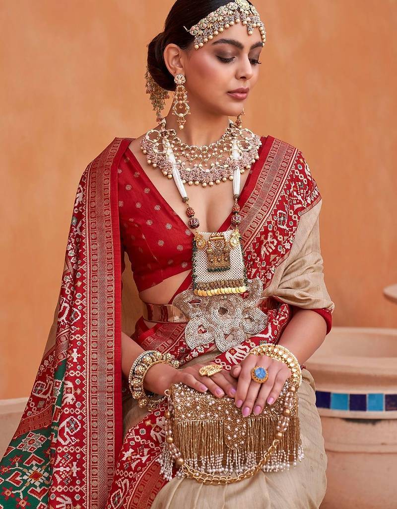 Green ethnic motifs printed silk blend saree