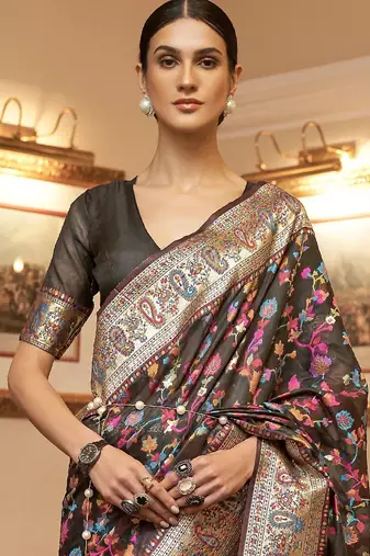 Sea green floral woven design zari saree